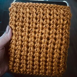 Hand-crochet rust colored Kindle Paperwhite Tablet Sleeve.